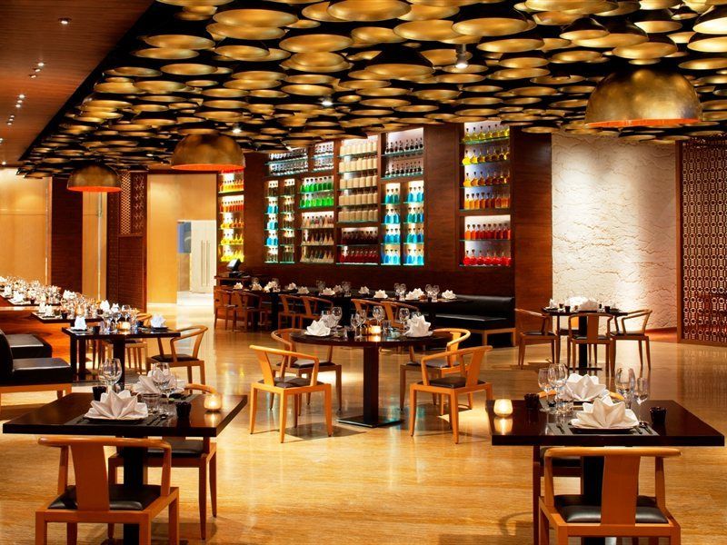 Radisson Blu Hotel New Delhi Dwarka Bagian luar foto The interior of the restaurant